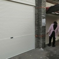 弥渡附近维修卷闸门电动车库门价格